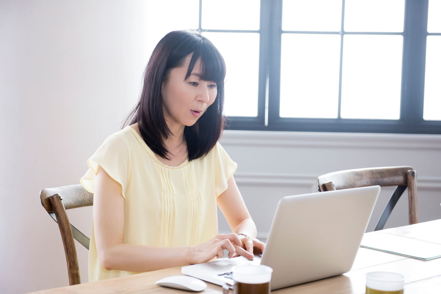 Japanese woman working at computer